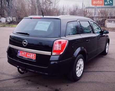 Черный Опель Астра, объемом двигателя 1.6 л и пробегом 172 тыс. км за 5350 $, фото 5 на Automoto.ua