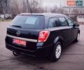 Черный Опель Астра, объемом двигателя 1.6 л и пробегом 172 тыс. км за 5350 $, фото 5 на Automoto.ua