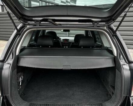 Черный Опель Астра, объемом двигателя 1.6 л и пробегом 152 тыс. км за 7200 $, фото 62 на Automoto.ua