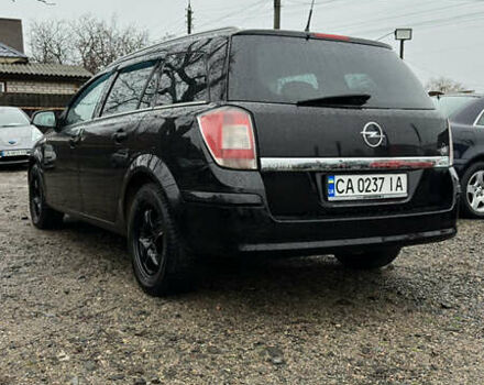 Черный Опель Астра, объемом двигателя 1.69 л и пробегом 242 тыс. км за 6200 $, фото 3 на Automoto.ua