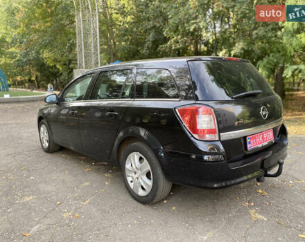 Черный Опель Астра, объемом двигателя 1.6 л и пробегом 200 тыс. км за 6400 $, фото 16 на Automoto.ua