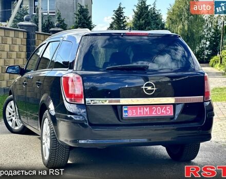 Черный Опель Астра, объемом двигателя 1.6 л и пробегом 195 тыс. км за 6700 $, фото 2 на Automoto.ua