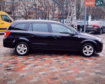 Черный Опель Астра, объемом двигателя 1.6 л и пробегом 212 тыс. км за 5750 $, фото 3 на Automoto.ua