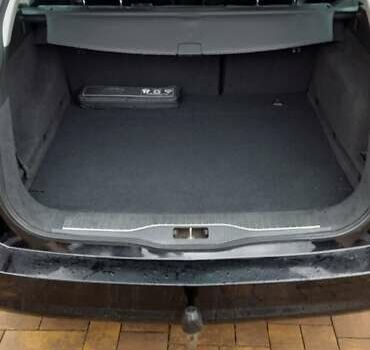 Черный Опель Астра, объемом двигателя 1.69 л и пробегом 252 тыс. км за 5600 $, фото 3 на Automoto.ua