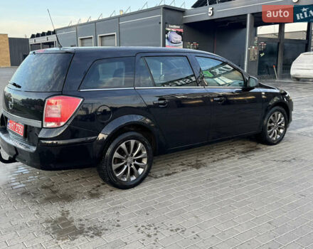 Черный Опель Астра, объемом двигателя 1.6 л и пробегом 219 тыс. км за 5500 $, фото 2 на Automoto.ua