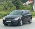 Черный Опель Астра, объемом двигателя 1.8 л и пробегом 205 тыс. км за 5400 $, фото 1 на Automoto.ua