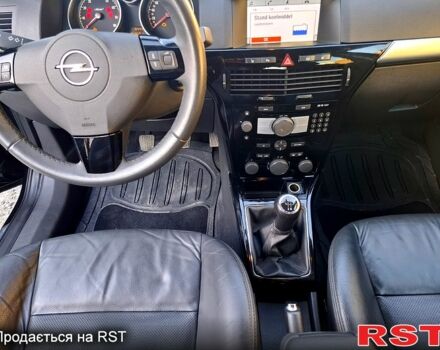 Опель Астра 2010 у Харкові на Automoto.ua Чорний Опель Астра, об'ємом двигуна 1.6 л та пробігом 157 тис. км за 6799 $, фото 5 на Automoto.ua