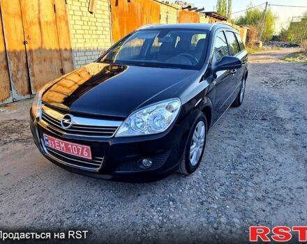 Опель Астра 2010 у Харкові на Automoto.ua Чорний Опель Астра, об'ємом двигуна 1.6 л та пробігом 157 тис. км за 6799 $, фото 1 на Automoto.ua