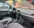 Черный Опель Астра, объемом двигателя 1.7 л и пробегом 239 тыс. км за 4550 $, фото 12 на Automoto.ua