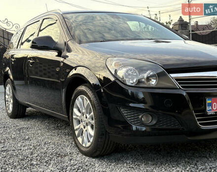 Черный Опель Астра, объемом двигателя 1.6 л и пробегом 252 тыс. км за 6400 $, фото 7 на Automoto.ua