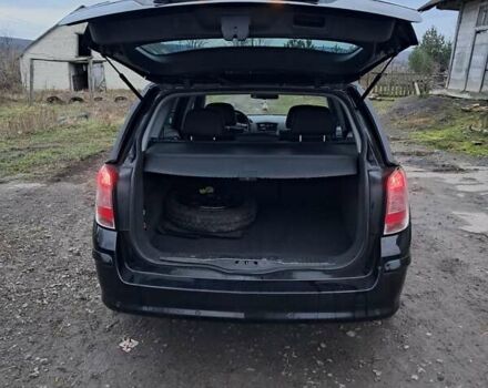 Черный Опель Астра, объемом двигателя 1.6 л и пробегом 216 тыс. км за 6200 $, фото 7 на Automoto.ua