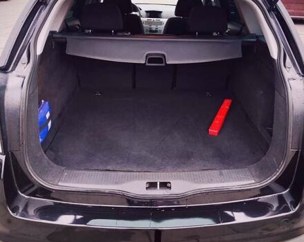 Черный Опель Астра, объемом двигателя 1.6 л и пробегом 237 тыс. км за 5350 $, фото 26 на Automoto.ua