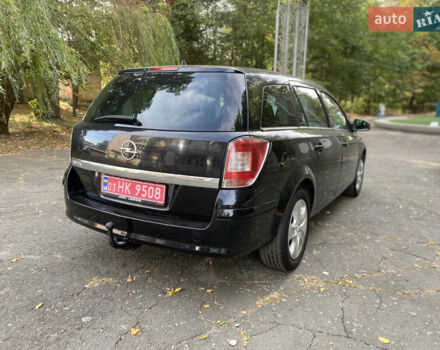 Черный Опель Астра, объемом двигателя 1.6 л и пробегом 200 тыс. км за 6400 $, фото 10 на Automoto.ua