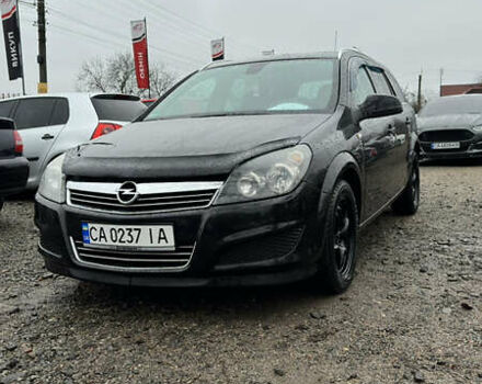 Черный Опель Астра, объемом двигателя 1.69 л и пробегом 242 тыс. км за 6200 $, фото 1 на Automoto.ua