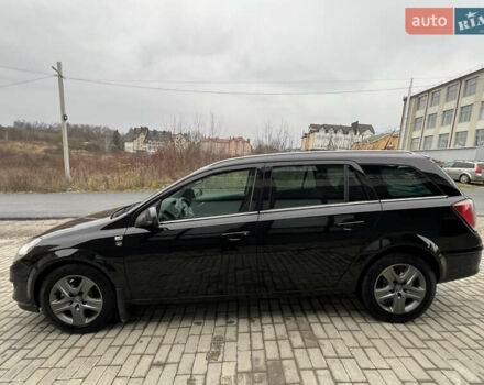 Черный Опель Астра, объемом двигателя 1.7 л и пробегом 264 тыс. км за 5799 $, фото 13 на Automoto.ua