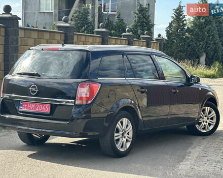 Черный Опель Астра, объемом двигателя 1.6 л и пробегом 195 тыс. км за 5900 $, фото 12 на Automoto.ua