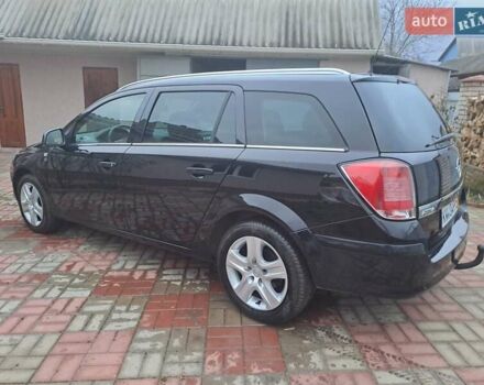 Черный Опель Астра, объемом двигателя 1.6 л и пробегом 209 тыс. км за 5800 $, фото 6 на Automoto.ua