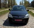 Черный Опель Астра, объемом двигателя 1.6 л и пробегом 230 тыс. км за 5600 $, фото 1 на Automoto.ua