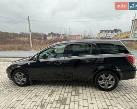 Черный Опель Астра, объемом двигателя 1.7 л и пробегом 264 тыс. км за 5799 $, фото 14 на Automoto.ua