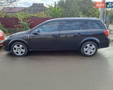 Черный Опель Астра, объемом двигателя 1.6 л и пробегом 209 тыс. км за 5100 $, фото 1 на Automoto.ua