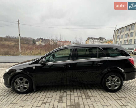 Черный Опель Астра, объемом двигателя 1.7 л и пробегом 264 тыс. км за 5799 $, фото 12 на Automoto.ua