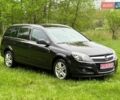 Черный Опель Астра, объемом двигателя 1.6 л и пробегом 208 тыс. км за 5950 $, фото 1 на Automoto.ua