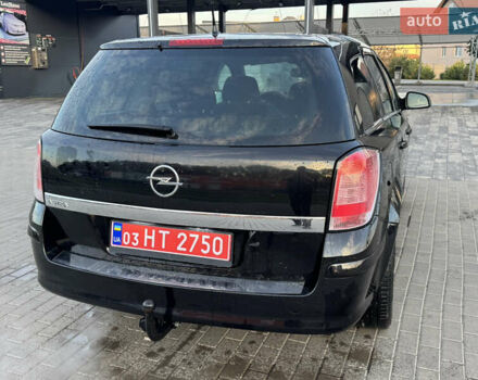 Черный Опель Астра, объемом двигателя 1.6 л и пробегом 219 тыс. км за 5500 $, фото 3 на Automoto.ua