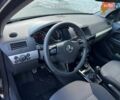 Черный Опель Астра, объемом двигателя 1.6 л и пробегом 219 тыс. км за 5600 $, фото 15 на Automoto.ua