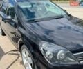 Черный Опель Астра, объемом двигателя 1.91 л и пробегом 335 тыс. км за 5600 $, фото 2 на Automoto.ua