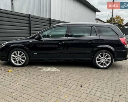 Черный Опель Астра, объемом двигателя 1.6 л и пробегом 152 тыс. км за 7200 $, фото 32 на Automoto.ua