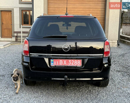 Черный Опель Астра, объемом двигателя 1.6 л и пробегом 252 тыс. км за 6400 $, фото 85 на Automoto.ua