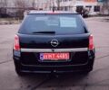 Черный Опель Астра, объемом двигателя 1.6 л и пробегом 172 тыс. км за 5350 $, фото 6 на Automoto.ua