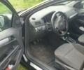 Черный Опель Астра, объемом двигателя 1.4 л и пробегом 150 тыс. км за 6100 $, фото 15 на Automoto.ua
