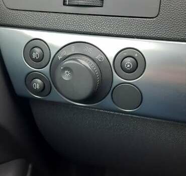 Черный Опель Астра, объемом двигателя 1.69 л и пробегом 252 тыс. км за 5600 $, фото 5 на Automoto.ua