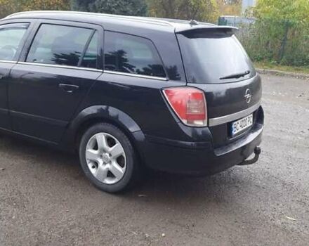 Черный Опель Астра, объемом двигателя 1.69 л и пробегом 252 тыс. км за 5600 $, фото 11 на Automoto.ua