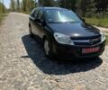 Черный Опель Астра, объемом двигателя 1.6 л и пробегом 230 тыс. км за 5600 $, фото 2 на Automoto.ua