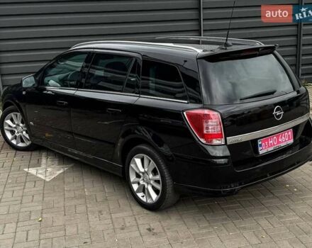 Черный Опель Астра, объемом двигателя 1.6 л и пробегом 152 тыс. км за 7200 $, фото 23 на Automoto.ua