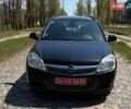 Черный Опель Астра, объемом двигателя 1.6 л и пробегом 230 тыс. км за 6100 $, фото 1 на Automoto.ua