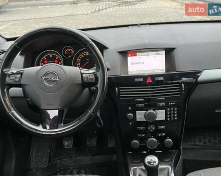 Черный Опель Астра, объемом двигателя 1.7 л и пробегом 264 тыс. км за 5799 $, фото 47 на Automoto.ua