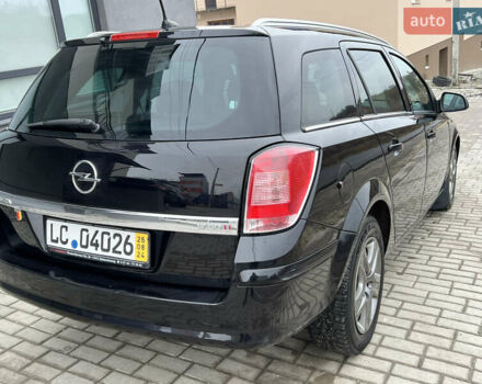 Черный Опель Астра, объемом двигателя 1.7 л и пробегом 264 тыс. км за 5799 $, фото 24 на Automoto.ua