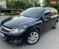 Черный Опель Астра, объемом двигателя 1.9 л и пробегом 320 тыс. км за 6700 $, фото 1 на Automoto.ua