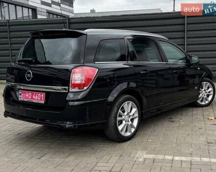 Черный Опель Астра, объемом двигателя 1.6 л и пробегом 152 тыс. км за 7200 $, фото 25 на Automoto.ua