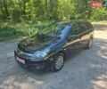 Черный Опель Астра, объемом двигателя 1.7 л и пробегом 250 тыс. км за 6750 $, фото 1 на Automoto.ua