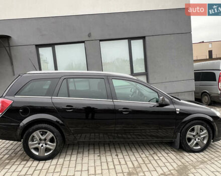 Черный Опель Астра, объемом двигателя 1.7 л и пробегом 264 тыс. км за 5799 $, фото 26 на Automoto.ua