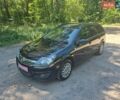 Черный Опель Астра, объемом двигателя 1.7 л и пробегом 250 тыс. км за 6750 $, фото 1 на Automoto.ua