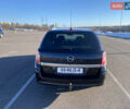 Черный Опель Астра, объемом двигателя 1.6 л и пробегом 245 тыс. км за 5900 $, фото 22 на Automoto.ua