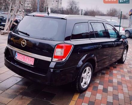Черный Опель Астра, объемом двигателя 1.6 л и пробегом 212 тыс. км за 5750 $, фото 12 на Automoto.ua