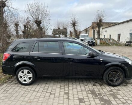 Черный Опель Астра, объемом двигателя 1.6 л и пробегом 319 тыс. км за 5200 $, фото 1 на Automoto.ua
