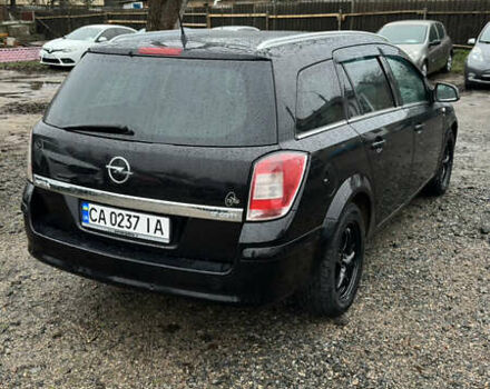 Черный Опель Астра, объемом двигателя 1.69 л и пробегом 242 тыс. км за 6200 $, фото 6 на Automoto.ua
