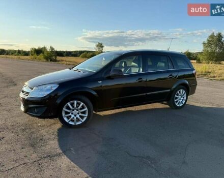 Черный Опель Астра, объемом двигателя 1.6 л и пробегом 175 тыс. км за 6300 $, фото 2 на Automoto.ua